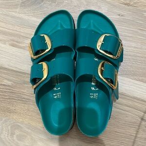 arizona big buckle high shine green birkenstocks.